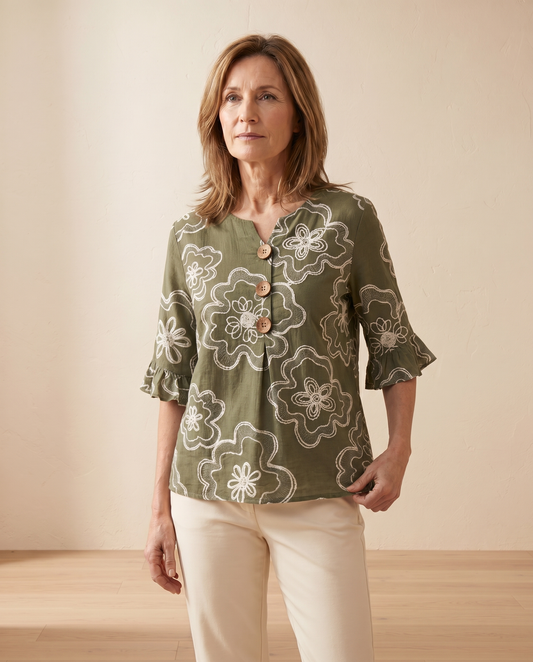 Martina - Blusa floral con botones y manga volante